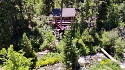 Hidden on the hillside above the stream