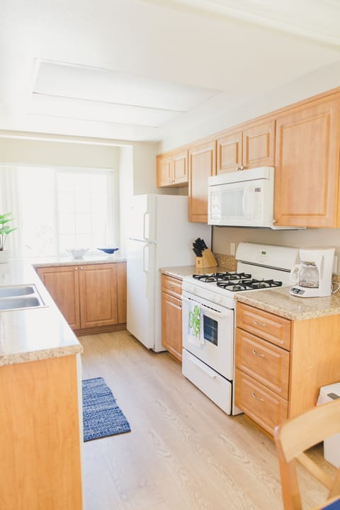 Bright, spacious kitchen with lots of cabinets