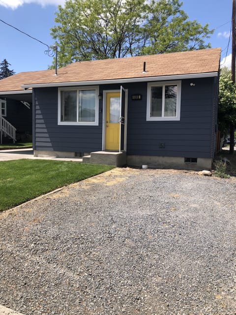 Front of Studio, gravel parking to the right of the lawn. 
