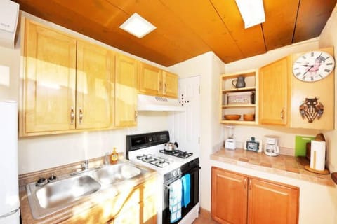 4 burner gas stove/oven, double sinks.  