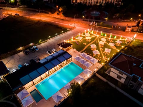 Outdoor pool, open 9:30 AM to 6:00 PM, free cabanas, pool umbrellas