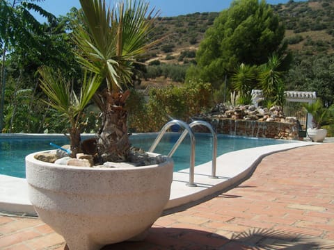 Swimming pool 13 mtr x 6 mtr with natural stone waterfall