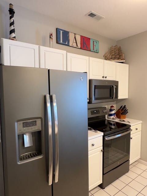 Updated appliances and well stocked kitchen.