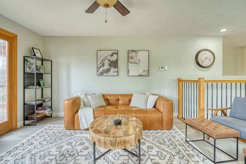 Living room with TV right off of the kitchen