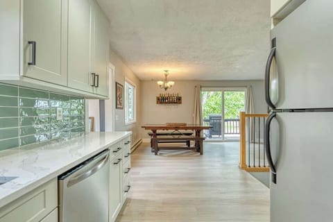 Kitchen and dining area. Dining table seats 8 with leaf spring 