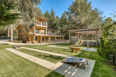 Beach Cabin has custom outdoor game courts for corn hole, and ladder golf