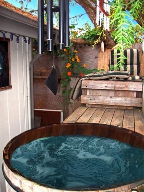 Take a soak in the bubbling cedar wood hot tub