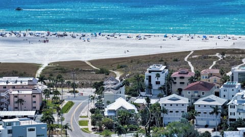 Aerial view showing our prime location just steps from Siesta Key Public Beach.
