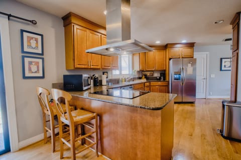 2 bar stools offer counter eating.