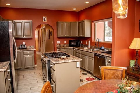 Beautifully remodeled kitchen with dinette seating for 4 people.