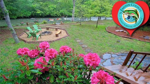 Looking off front porch swing! Notice river in front yard! 
Trout Capital of  GA