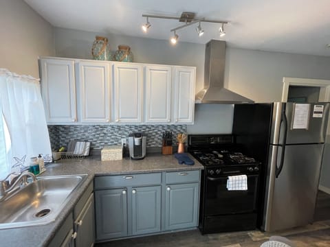 Full kitchen. Well stocked. Brita water filter. Ice maker. Keurig coffee maker.