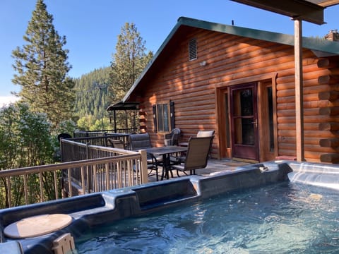 Enjoy the hot tub and deck with different views in every direction.