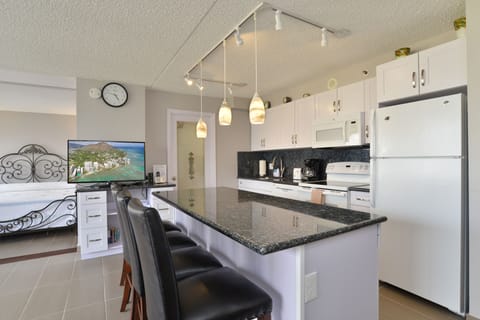 Full Kitchen with Granite Center Piece