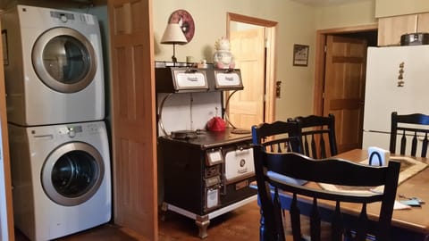 full size laundry center complete with iron & board 