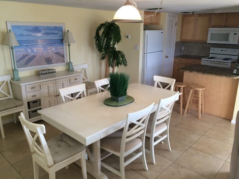 Dining table seats 6, or can seat 8 with the table expanded.