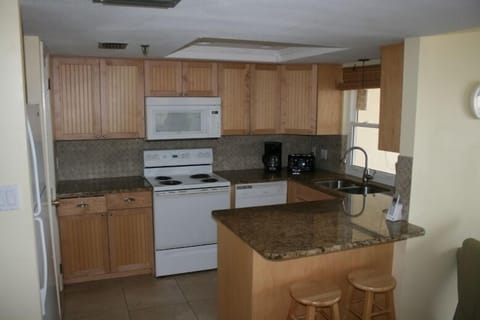 The kitchen includes a microwave, coffee maker, toaster and blender.  