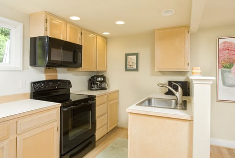 Our kitchen is well stocked with all amenities.