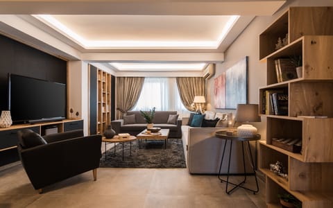 Acropolis Luxury Living | Living room | 42-inch Smart TV with cable channels, TV, Netflix