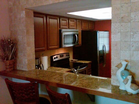 View to kitchen from bar