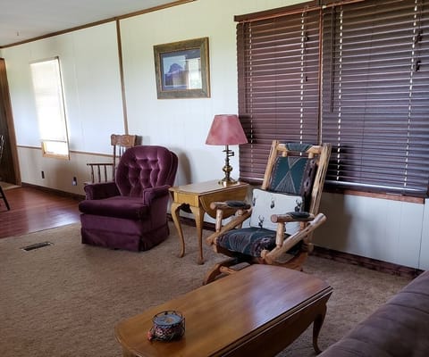 Living room with mountain views and satellite TV