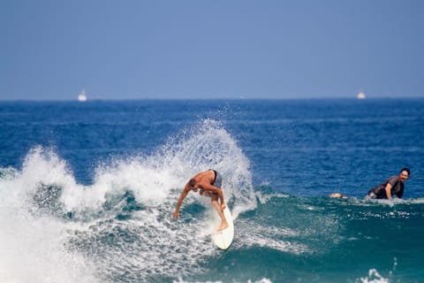 Watching surfers from the deck