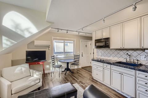 Smart TV, high speed WIFI, A/C, west facing window with partial flatiron views.