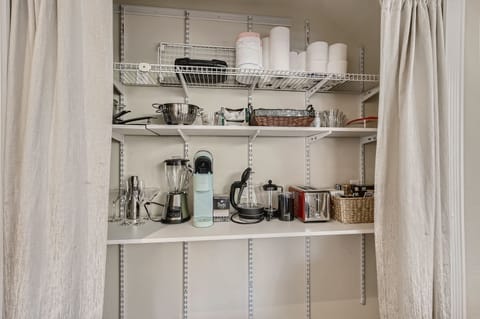 Well stocked pantry including a nice selection of tea and coffee.