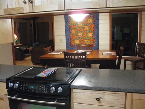 Kitchen opens into the dining room...very spacious..jennair range with griddle