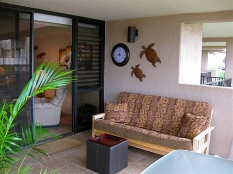 Extra large lanai. Table for 4 and a futon to relax on while taking in the view.