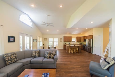 The Great Room with 12.5 foot vaulted ceilings and lots of windows