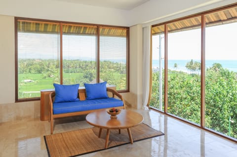 Family Villa, 2 Bedrooms, Ocean View | Living area | 32-inch LED TV with cable channels, TV