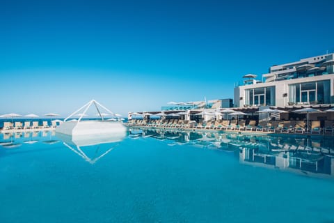 2 outdoor pools, pool umbrellas, sun loungers