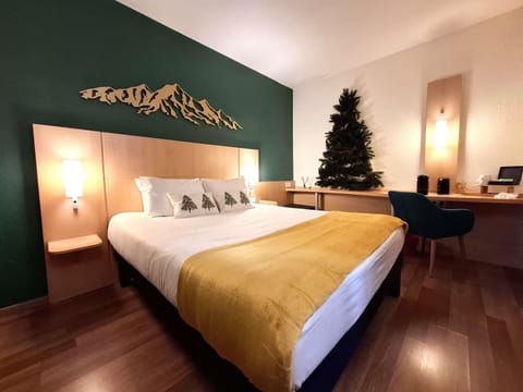 Premium bedding, desk, laptop workspace, blackout drapes