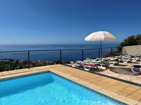 Swimming pool and sunbathing area