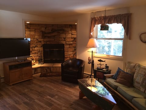 Cozy, fishing cabin theme throughout home.
