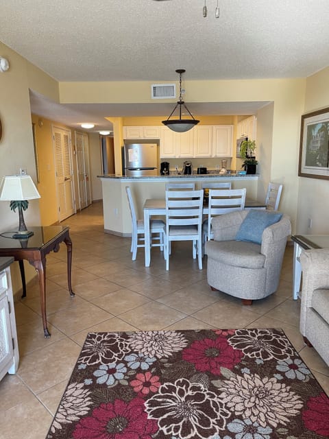 Oceanfront of condo, looking back toward living room and dining area and kitchen