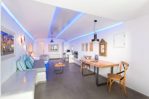 Suite, Hot Tub (Fable, Caldera View) | Living area | 40-inch plasma TV with satellite channels, TV