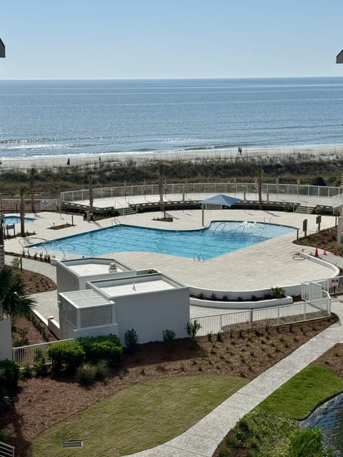 Overlook the Beach and New Pool from Your Window!
