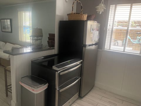Stainless Steel Refrigerator and Double Oven Stove