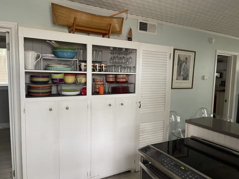 Cabinet with Dishes and Pans