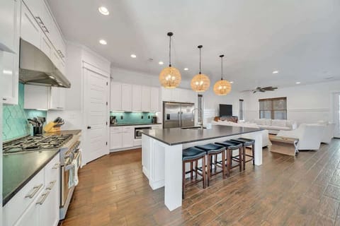 Large Kitchen Island with Eat in Bar Area