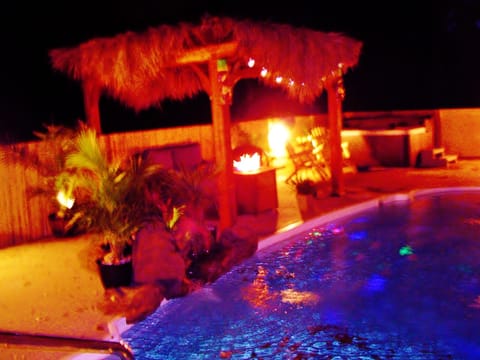 Tiki Pool, Waterfall, Blue Spa, Gas Grill, Volleyball, Yard Games, & Playground.