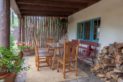 Shady porch for outdoor dining. This might well be your favorite spot!