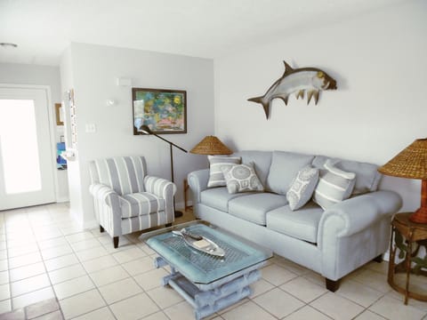Newly furnished living room with queen sleeper sofa