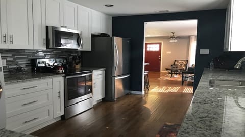 Kitchen opens to Living
