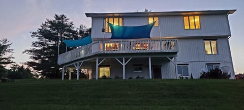 Large floor to ceiling windows, wrap around deck and patio to take in the views 