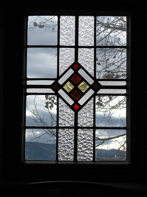 Stained glass widow in each bedroom and bathroom!