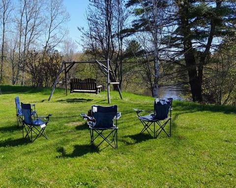 Enjoy a campfire overlooking the Manistique River. 