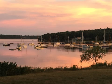 View from our property of sunrise reflected over the harbor.